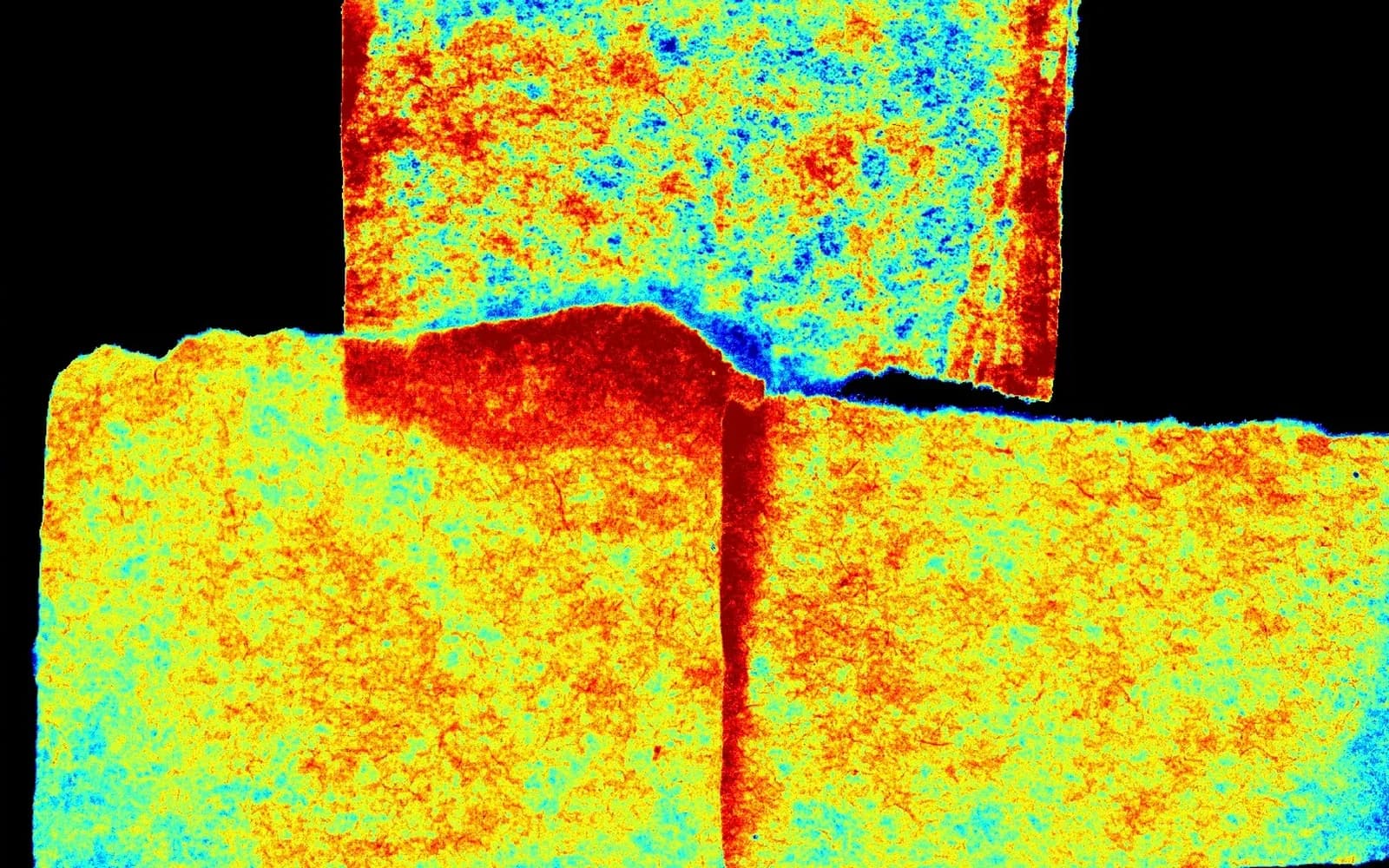 Mapa de homogeneidade em falsa cor, do azul (valores baixos) ao vermelho (valores altos): o papel branco, acima, alterna manchas; as metades do papel marrom, abaixo, são mais uniformes